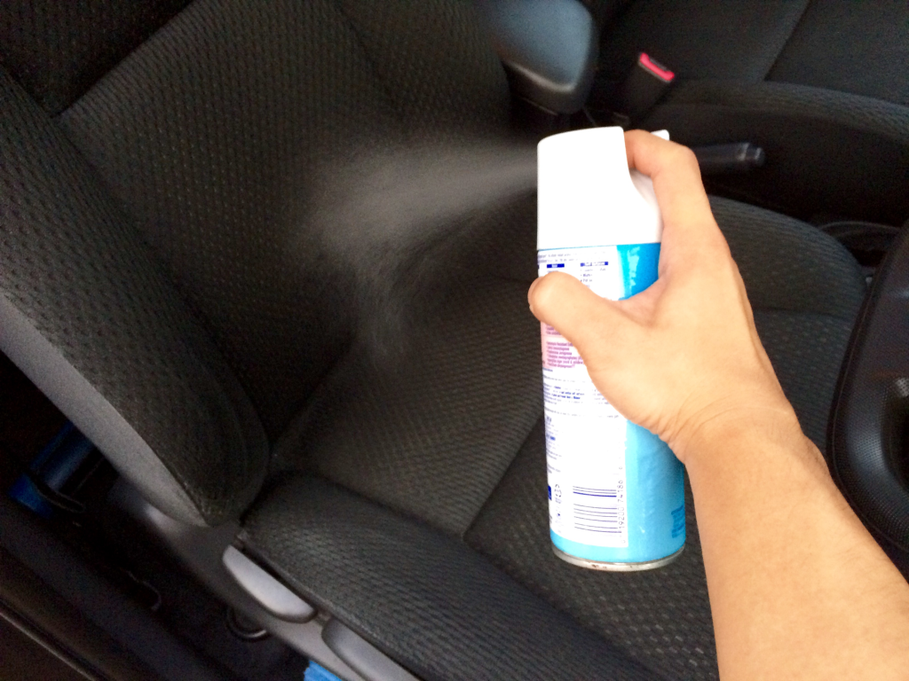Applying fabric protector to car seats