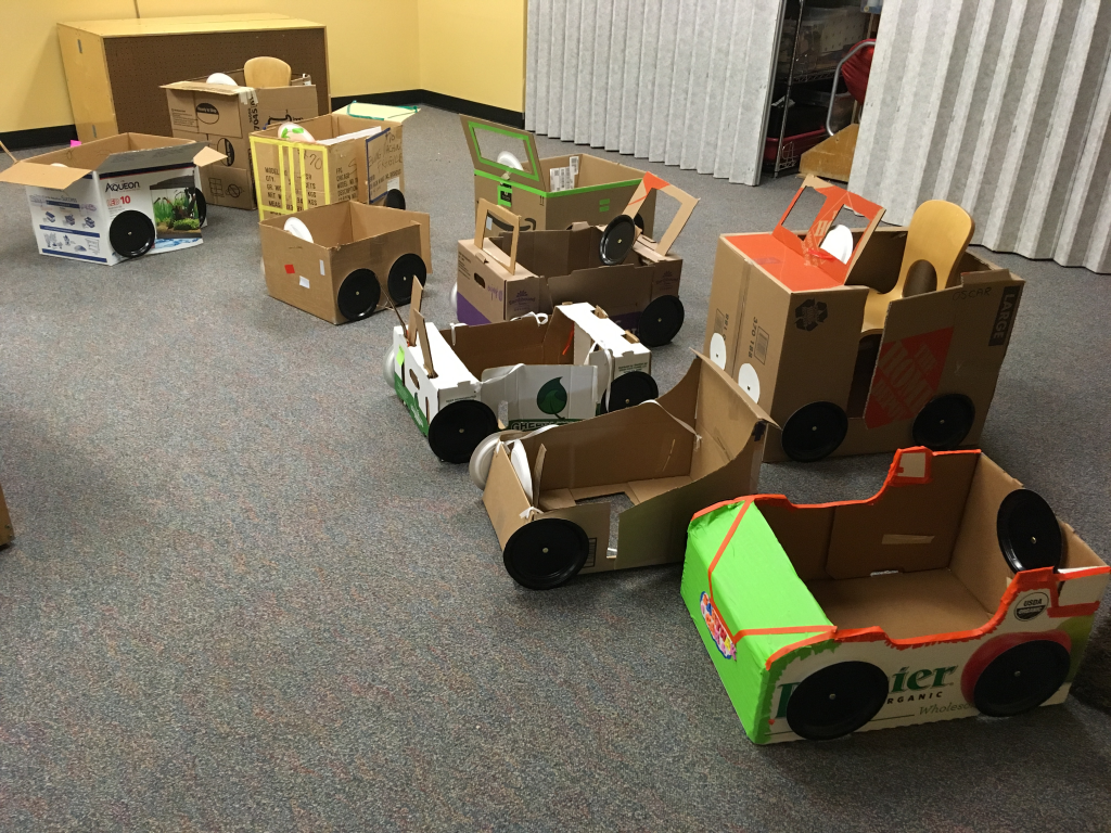 different sizes of cardboard cars
