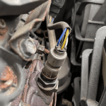 damaged O2 sensor in the car engine