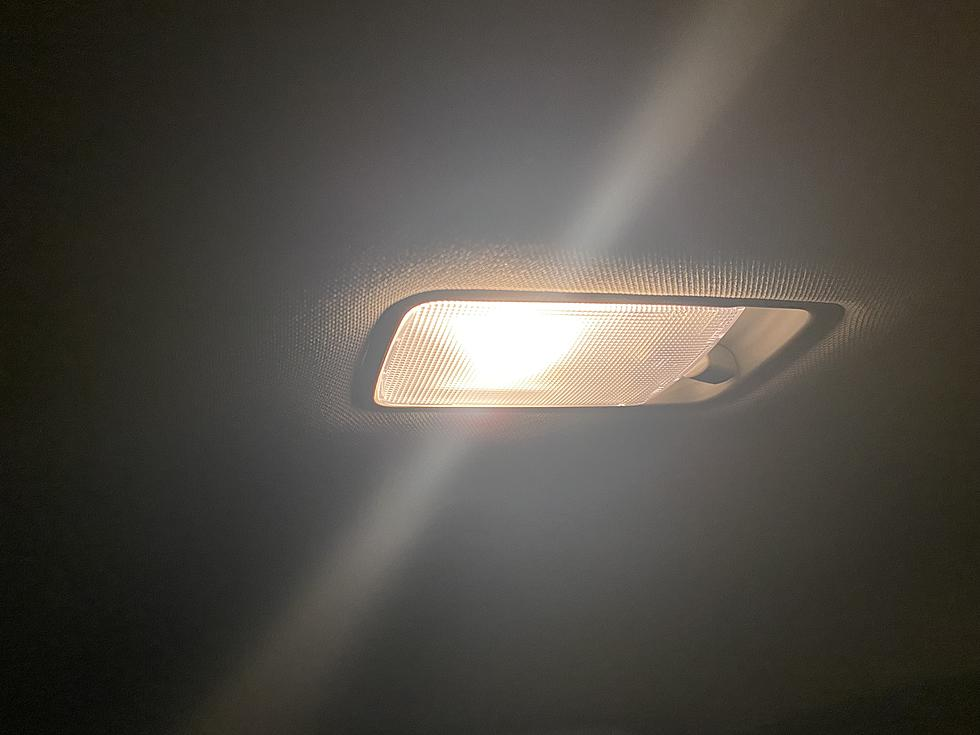 Dome lights in the center of the car's ceiling
