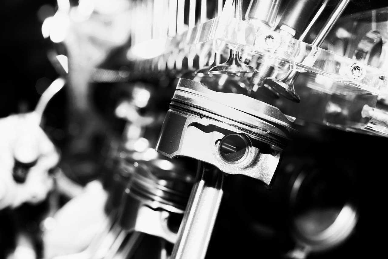 black and white piston picture of an engine