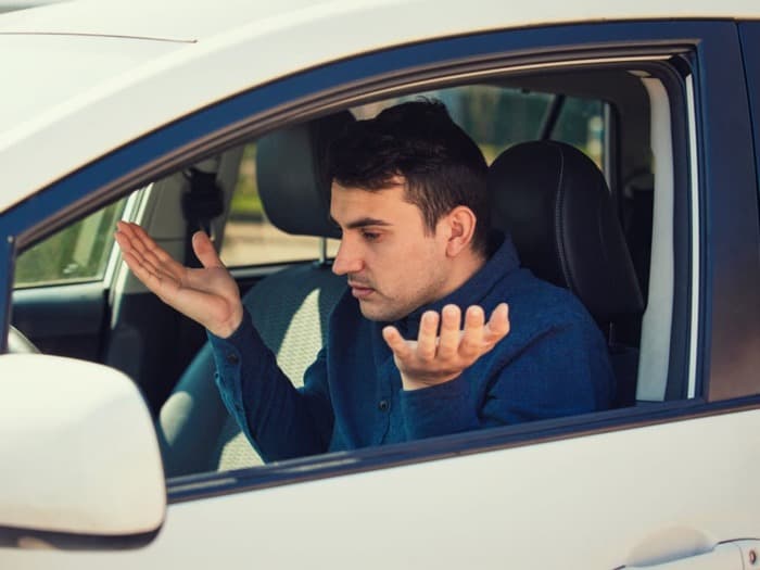 Frustrated driver in a car