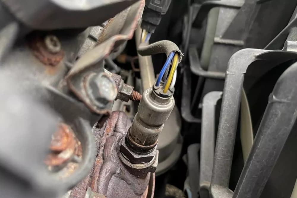 damaged O2 sensor in the car engine