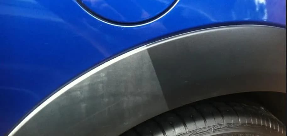 Before and after of restored black plastic rim