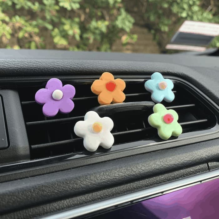 cute car accessories in the vent