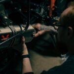 person fixing an error code