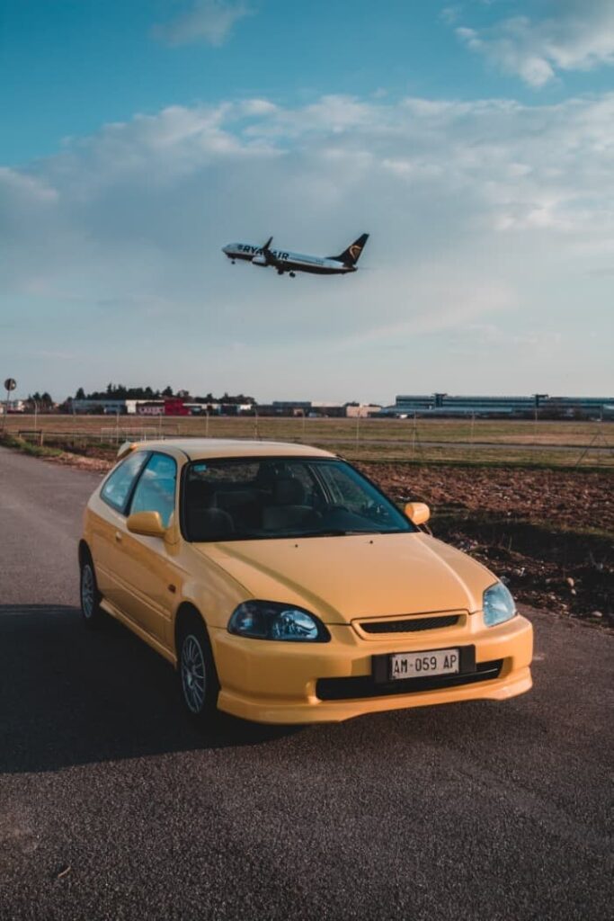 yellow ek hatch lowered with lip kit